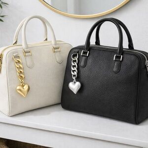 Set of silver and gold heart bag charm keychains